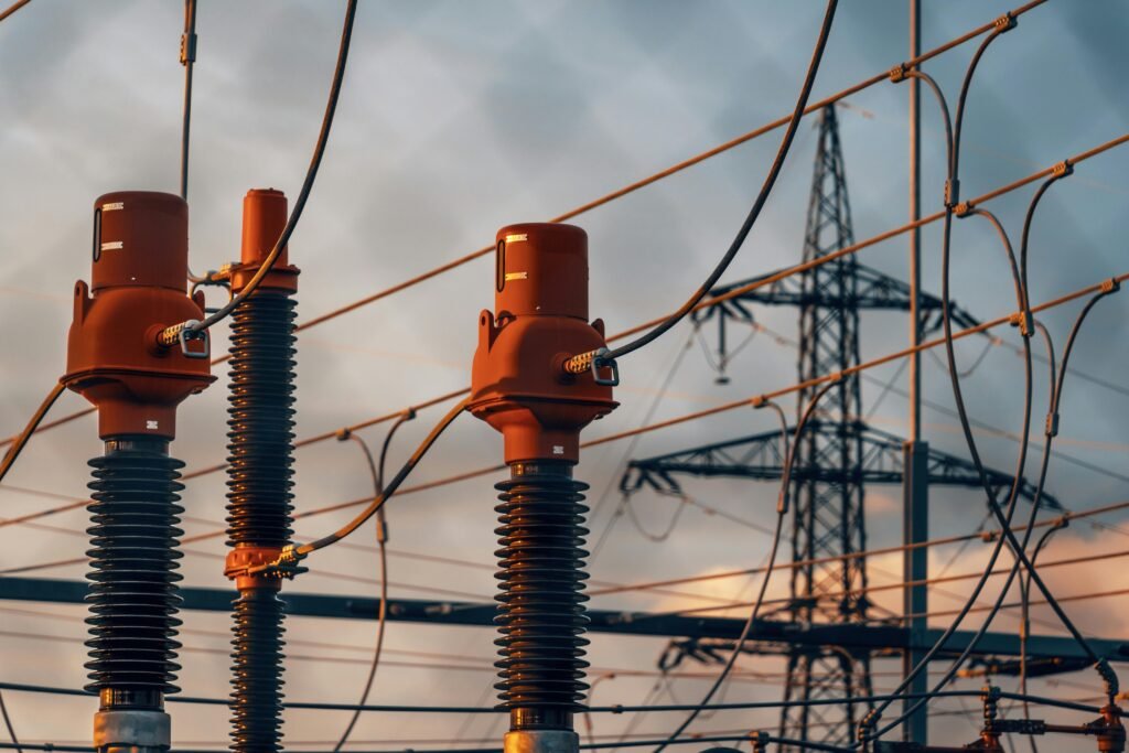 pexels-photo-28912010-28912010 Detailed view of power transformers and lines against a sunset sky in Austria.