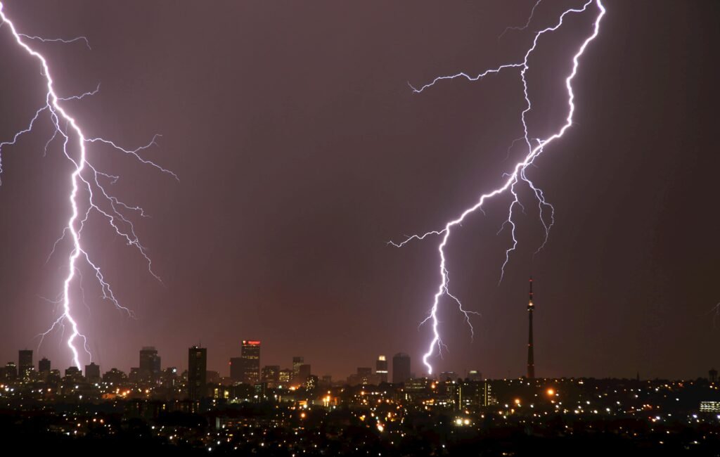pexels-photo-33187753-33187753 Captivating lightning strikes illuminate the Johannesburg skyline in a nighttime storm.